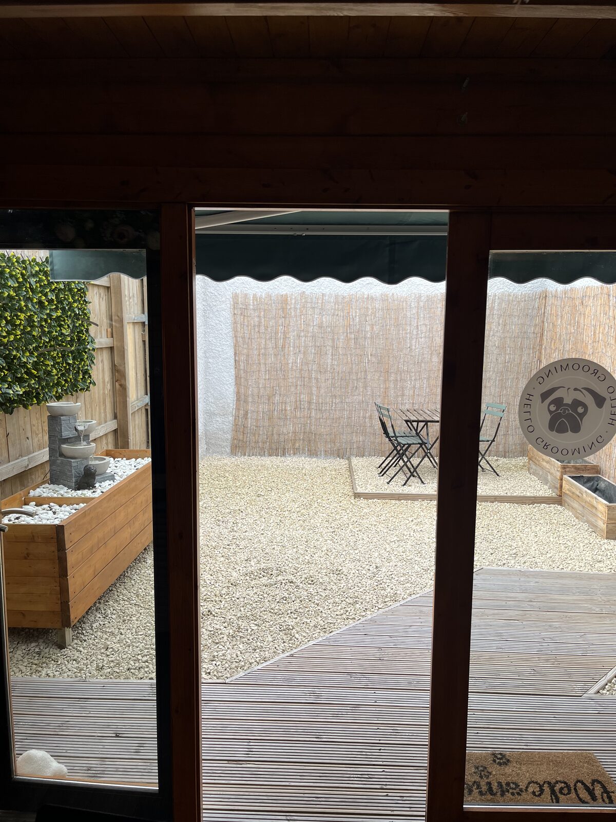 Quiet enclosed courtyard at Hello Grooming, Spennymoor The quiet enclosed courtyard seen from inside the cabin salon